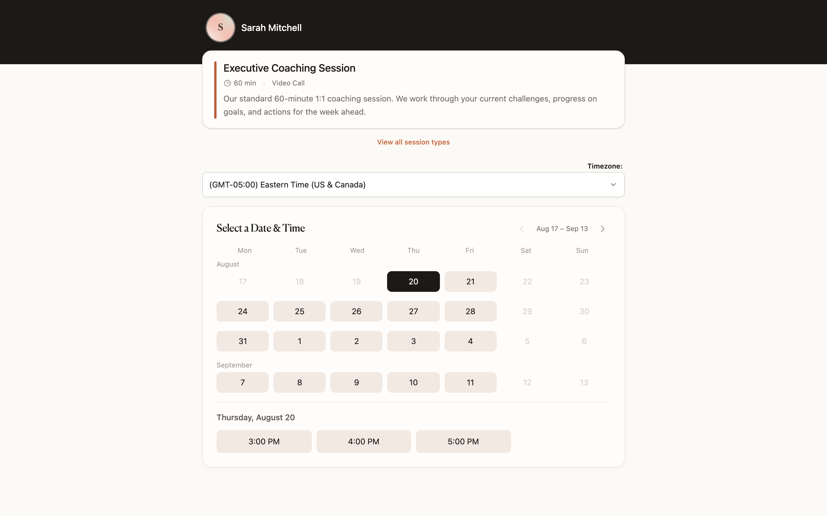 CoachBase public booking page for an executive coaching session, with available dates and times